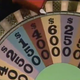 By laying the wheel flat and shooting it from above, art director Ed Flesh opened up the Wheel Of Fortune set’s sight lines for the cameras positioned on the floor.